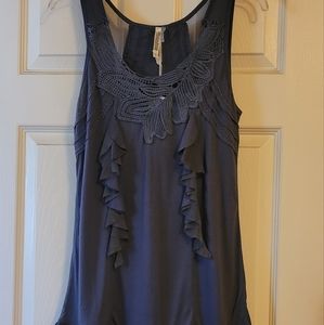 Gray short dress with ruffles & design in front.